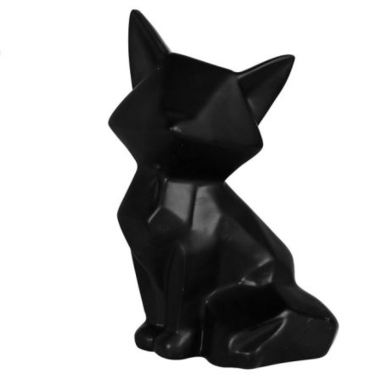 Statuette en céramique représentant un renard noir, ajoutant originalité et charme à la décoration intérieure.