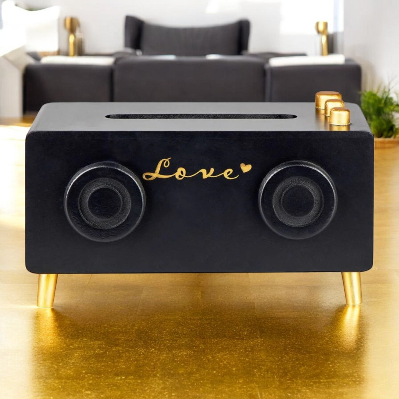Boîte à mouchoirs en bois avec design radio noir et doré, ajoutant une touche élégante et unique à la décoration intérieure.
