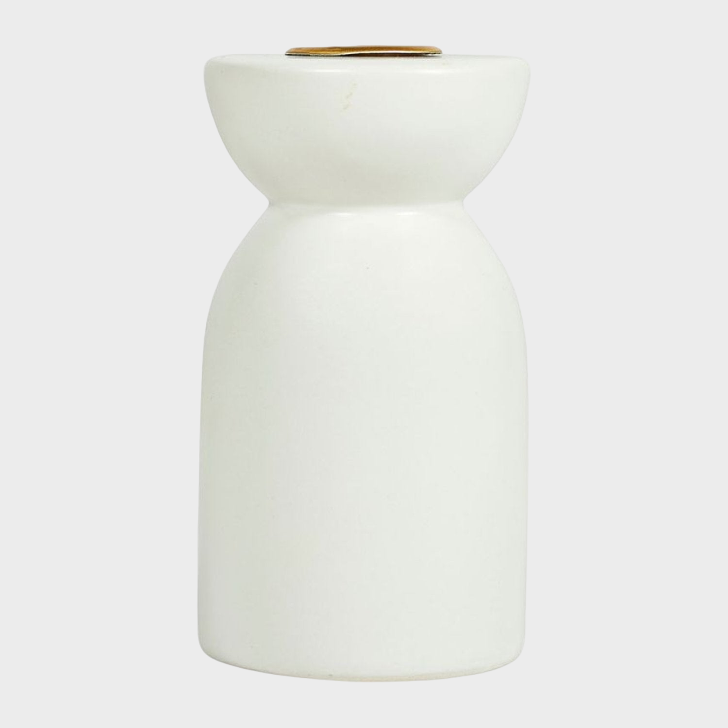 Bougeoir en dolomite blanc, ajoutant une touche d'élégance et une ambiance chaleureuse à la décoration intérieure.