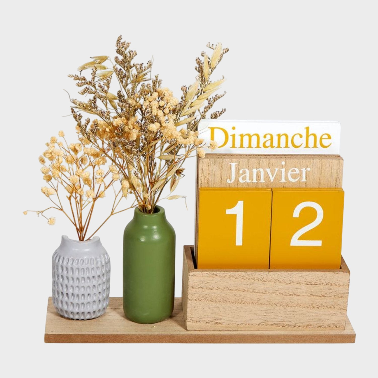 Calendrier perpétuel avec vases contenant des fleurs séchées, ajoutant une touche élégante et intemporelle à la décoration intérieure.