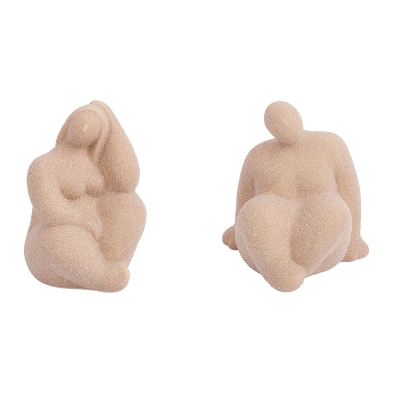Décorations à poser en forme de femmes rondes en sable rosé, disponibles en deux assortiments, apportant chaleur et féminité à la décoration intérieure.