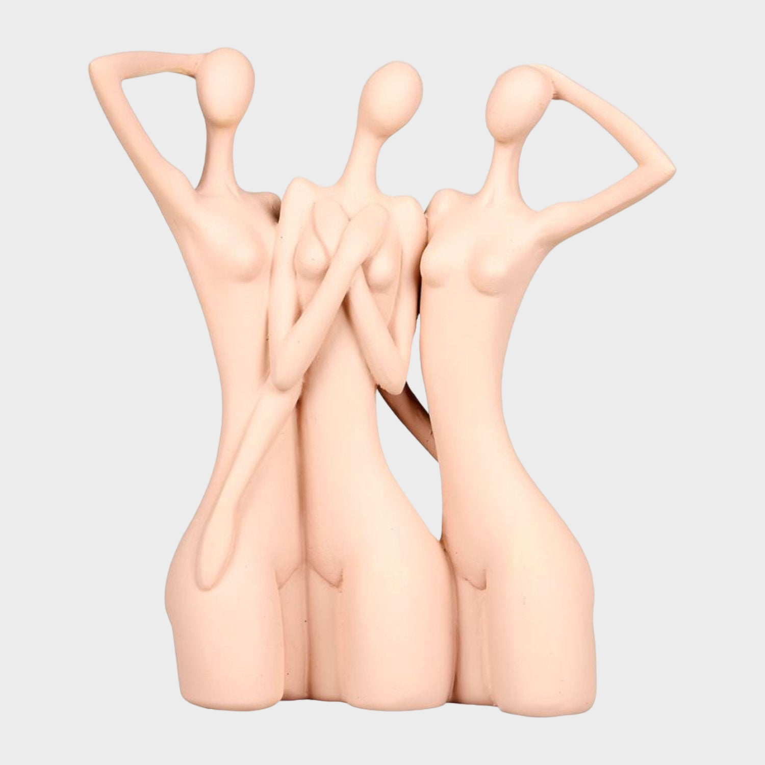 Déco en résine rose représentant trois femmes, ajoutant une touche de féminité et de charme à la décoration intérieure.