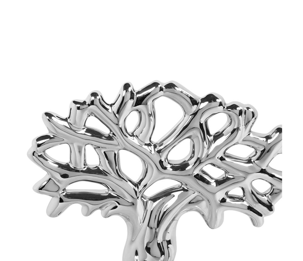 Décoration en céramique argentée représentant un arbre stylisé, symbolisant la vie et le renouveau.