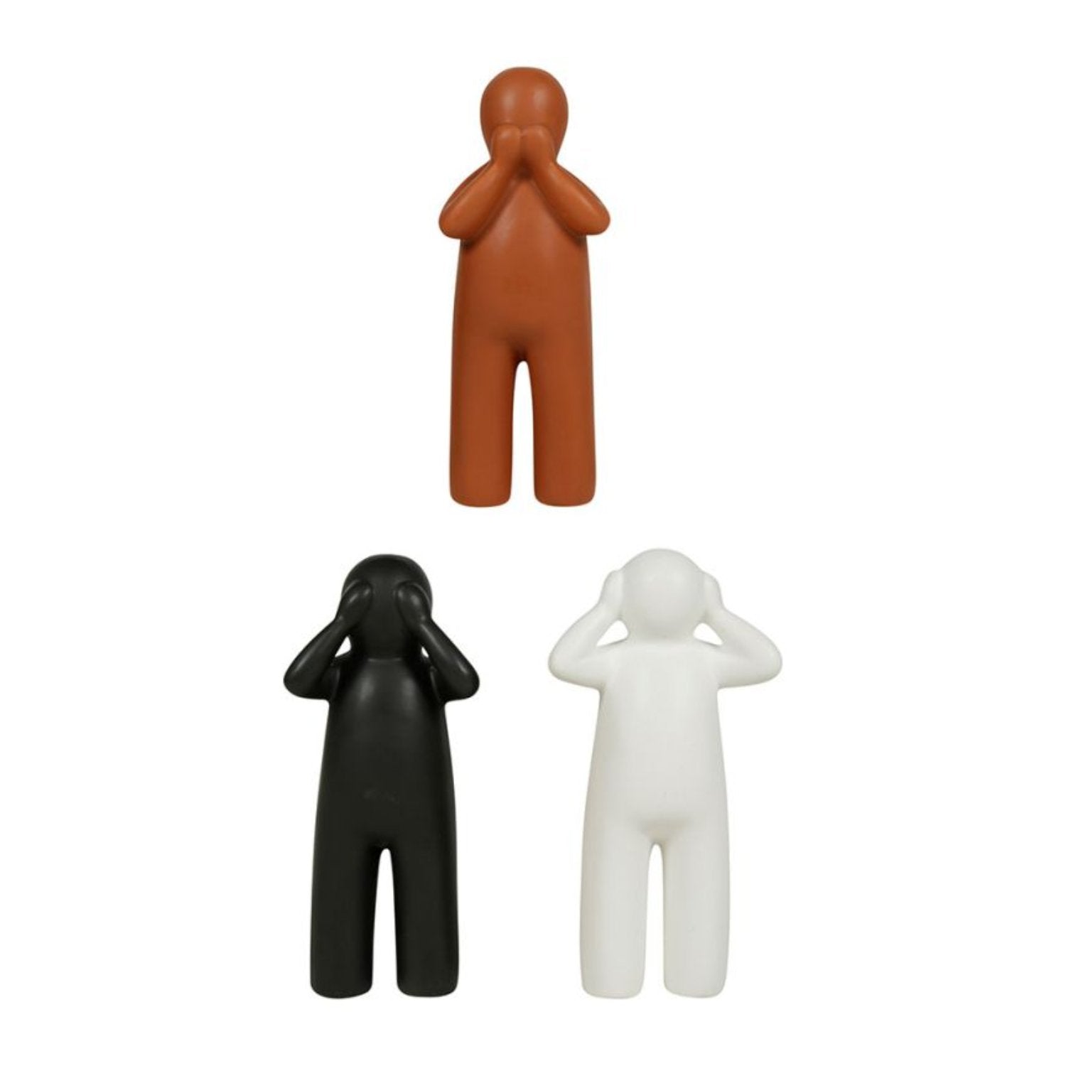 Figurines en céramique de personnages noirs, blancs et oranges, apportant une touche amusante et originale à la décoration intérieure.
